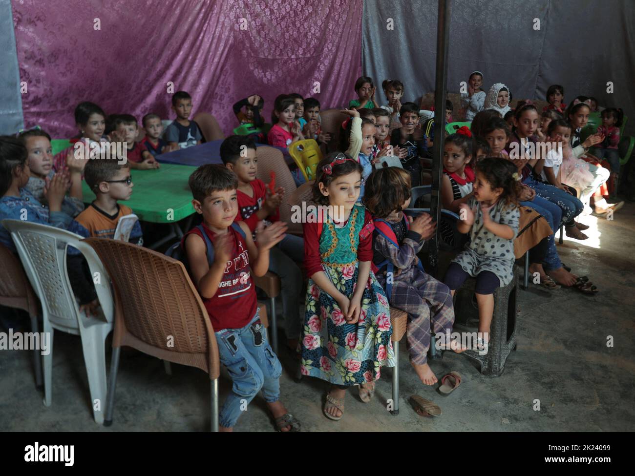 Internally displaced students attend a class inside a Byzantine castle that was transformed into a makeshift school for the internally displaced children, in the opposition-held Idlib, Syria September 20, 2022. REUTERS/Khalil Ashawi Stock Photo