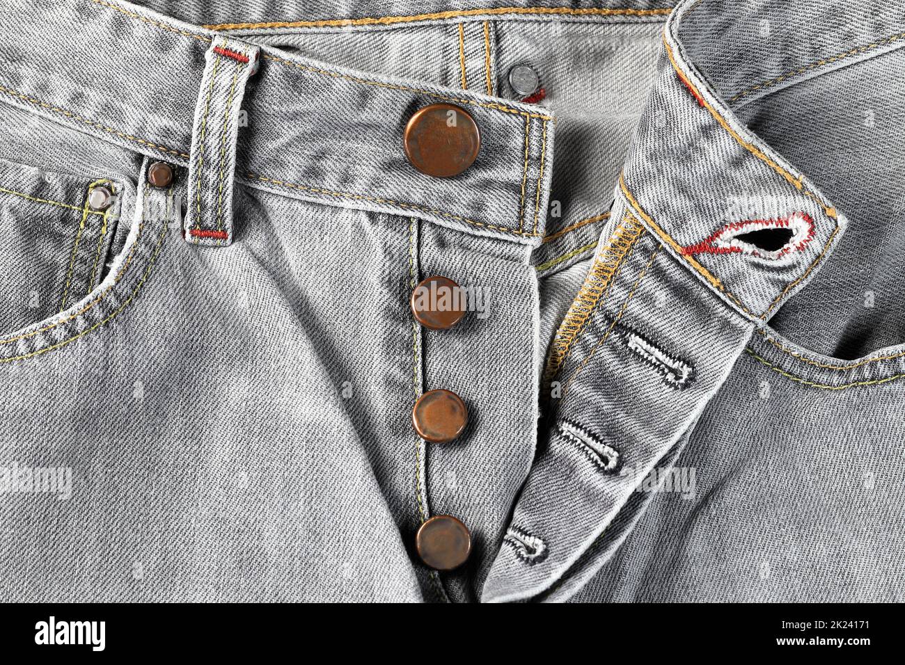 Close up Fashion Buttons on jeans, denim with seam of fashion design Stock Photo Alamy