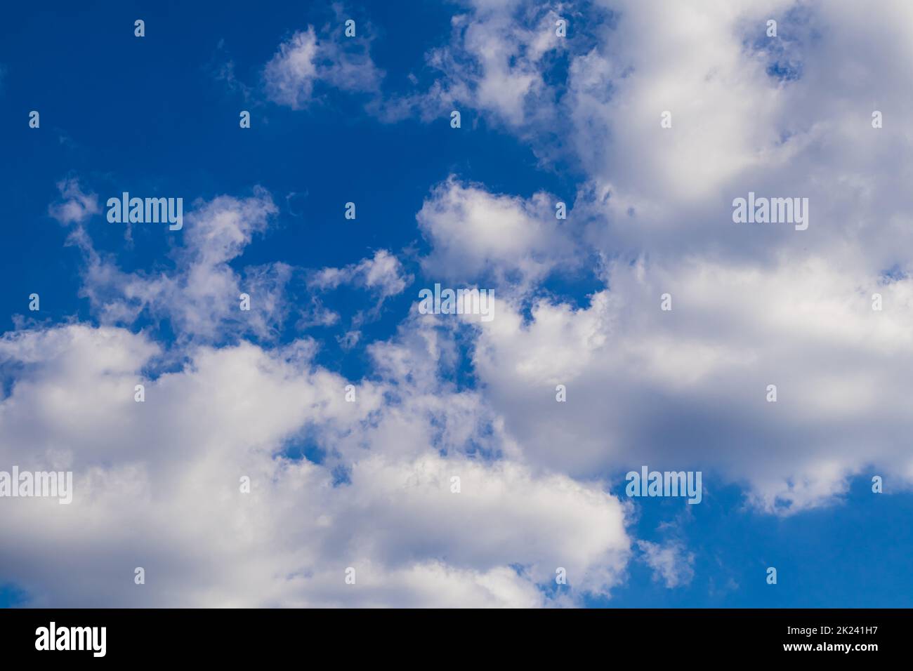 Blue sky with white clouds, . Background with place for text.Photo