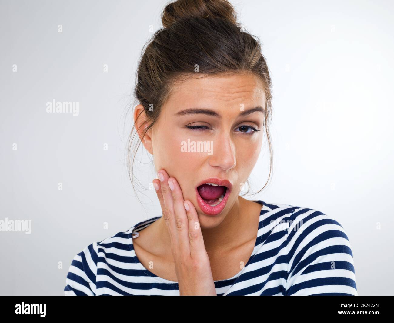 This is so boring. Portrait of a beautiful young expressive woman with