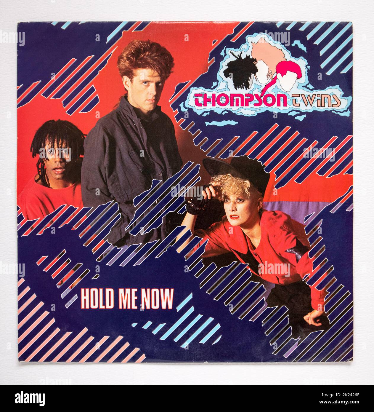 Picture cover of the 12 inch single version of Hold Me Now by the