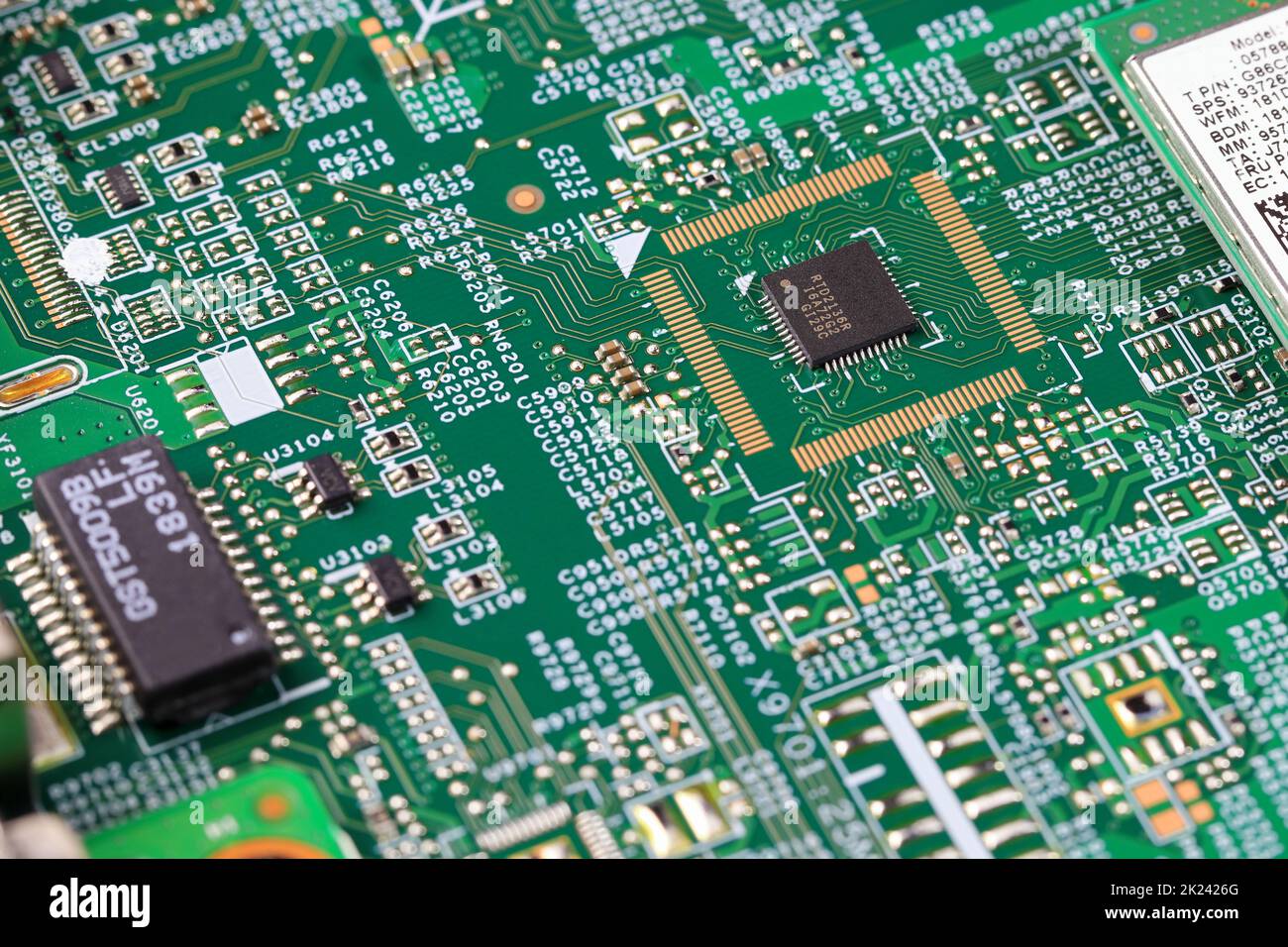 microprocessor on computer circuit board. Photo of electronic component in electronic device. Stock Photo