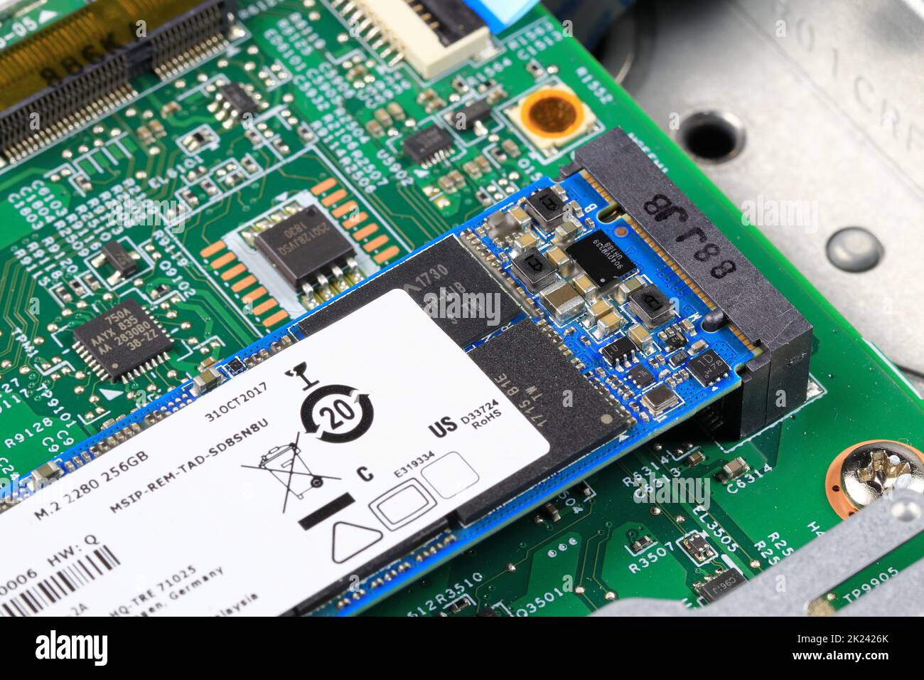 Installs the equipment - SSD NVME prepare to install on computer mainboard, Computer repair concept Close-up view, Hardware. Stock Photo