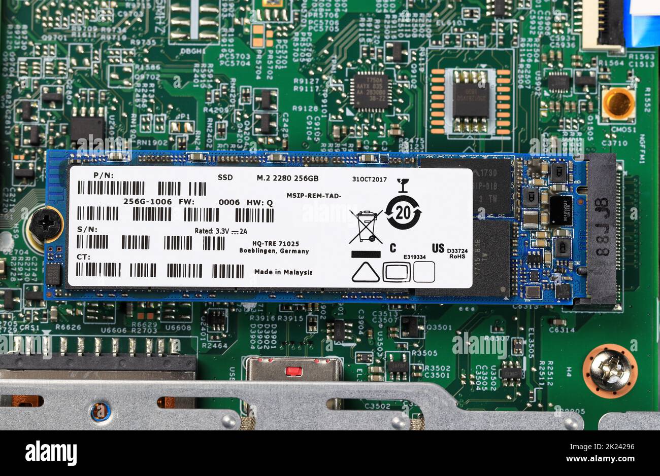 Installs the equipment - SSD NVME prepare to install on computer mainboard, Computer repair concept Close-up view, Hardware. Stock Photo