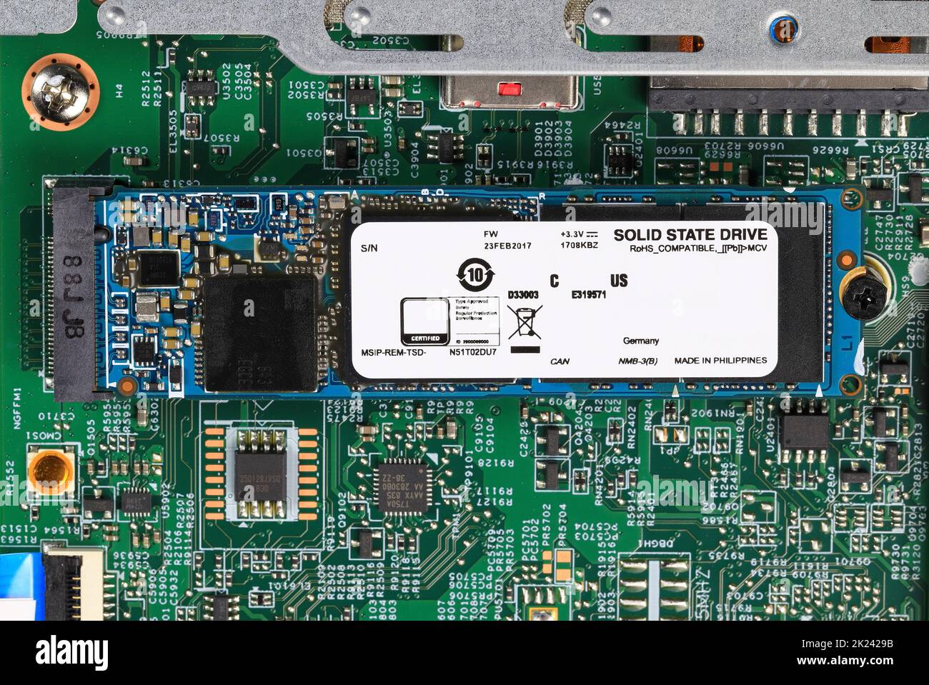Installs the equipment - SSD NVME prepare to install on computer mainboard, Computer repair concept Close-up view, Hardware. Stock Photo