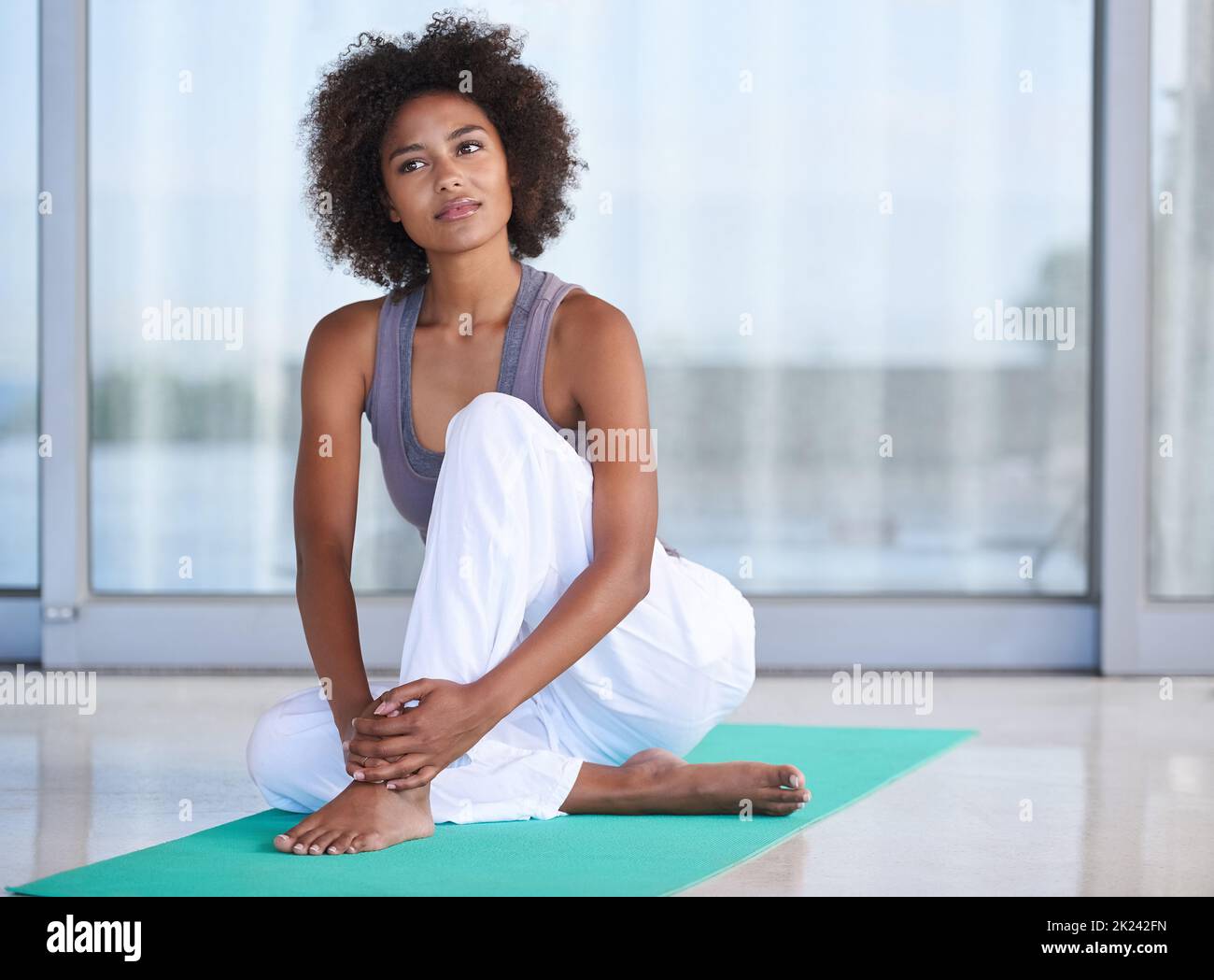 Pleasant Slim Woman Standing on the Yoga Mat Stock Photo - Image of  apartment, hobby: 136954162