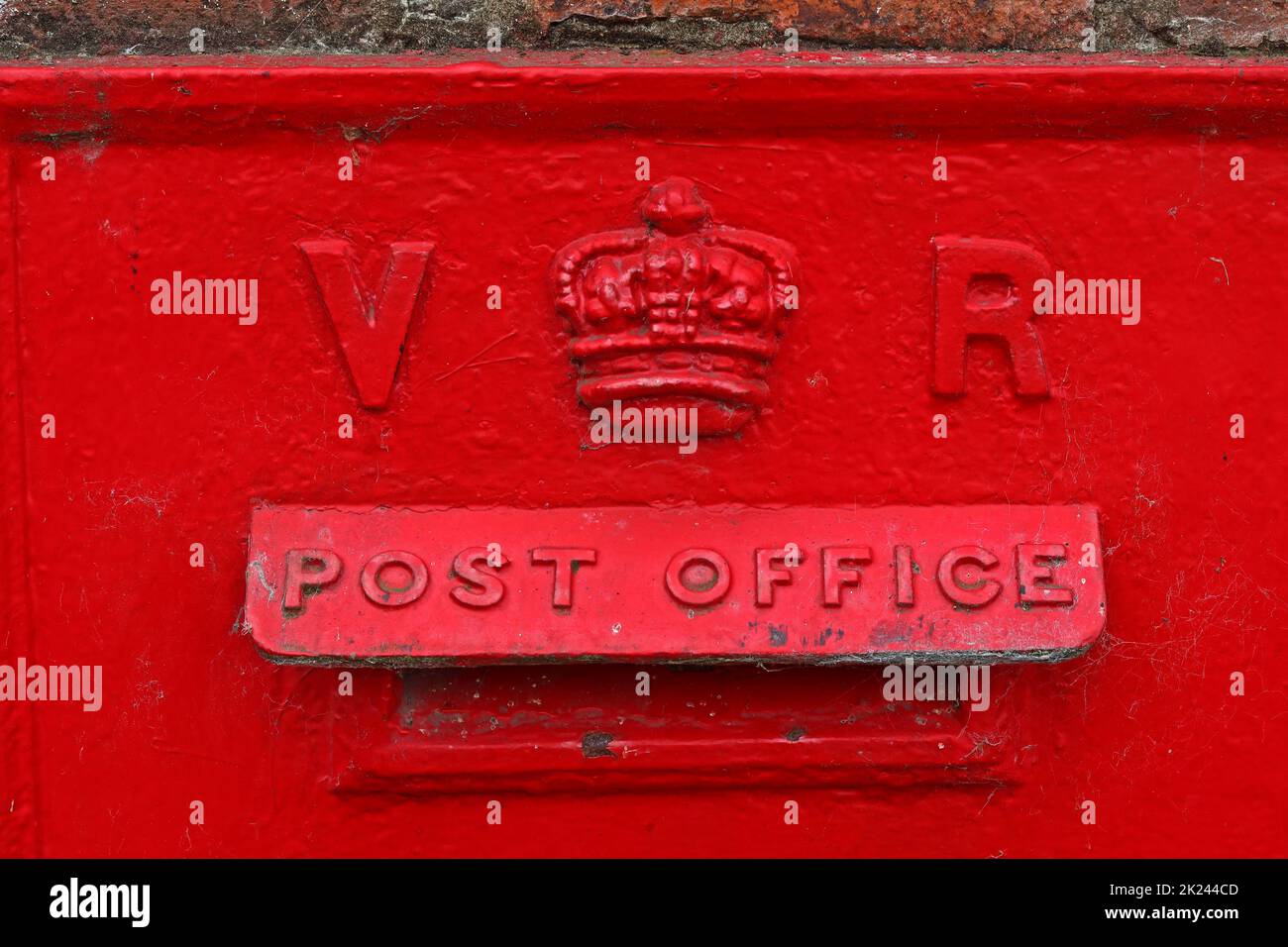Victoria Regina red British post office pillar box, Ellesmere Port, Cheshire, England, UK Stock Photo
