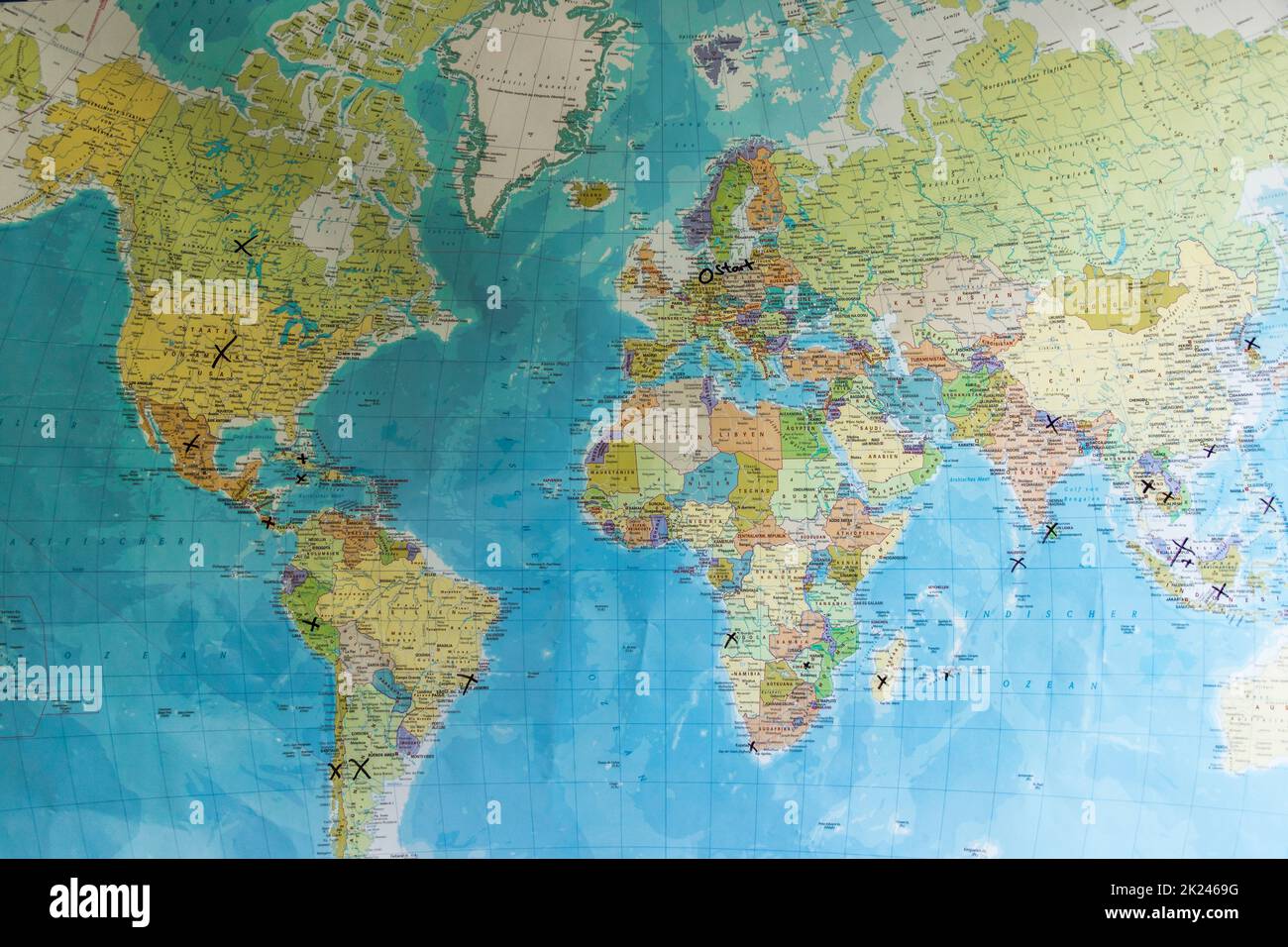 Start a world trip and plan your route on the world map. Select route from Europe via Africa to Asia. Stock Photo