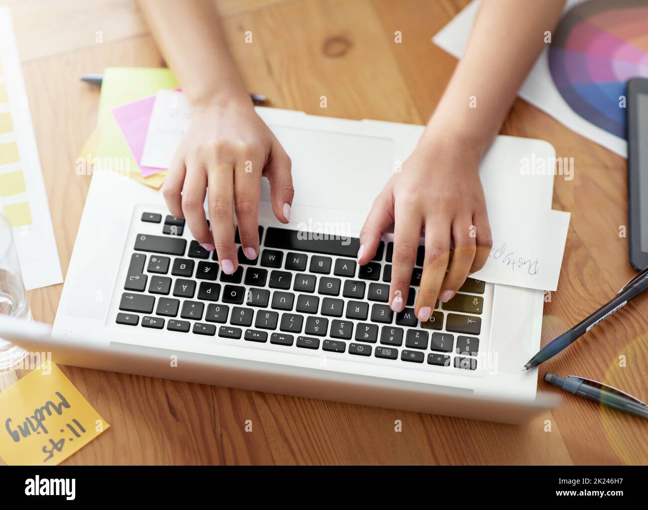 Design pro at work. a creative professional working on a laptop. Stock Photo