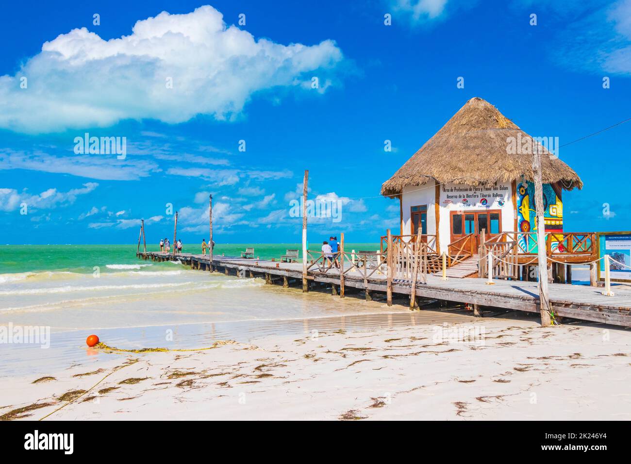 Holbox Mexico 21. December 2021 Panorama landscape view on beautiful Holbox island sandbank and beach with waves turquoise water and blue sky in Quint Stock Photo