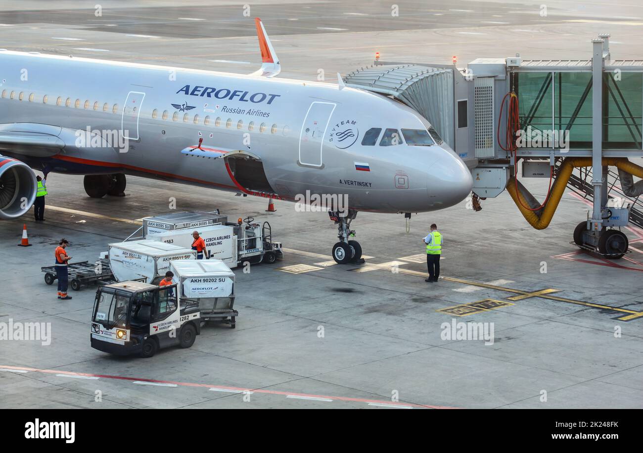 Prague, Czech Republic July 28th, 2018 Ground personnel loading baggage cargo into Aeroflot