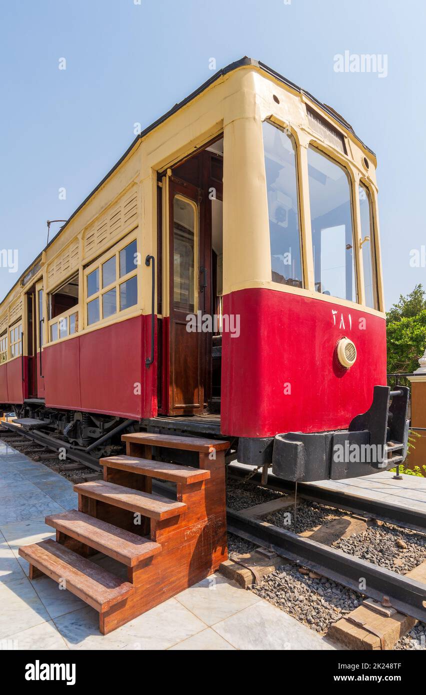 Classic Train Ramp Exterior of vintage tram with wooden stairs near open doors located on ...