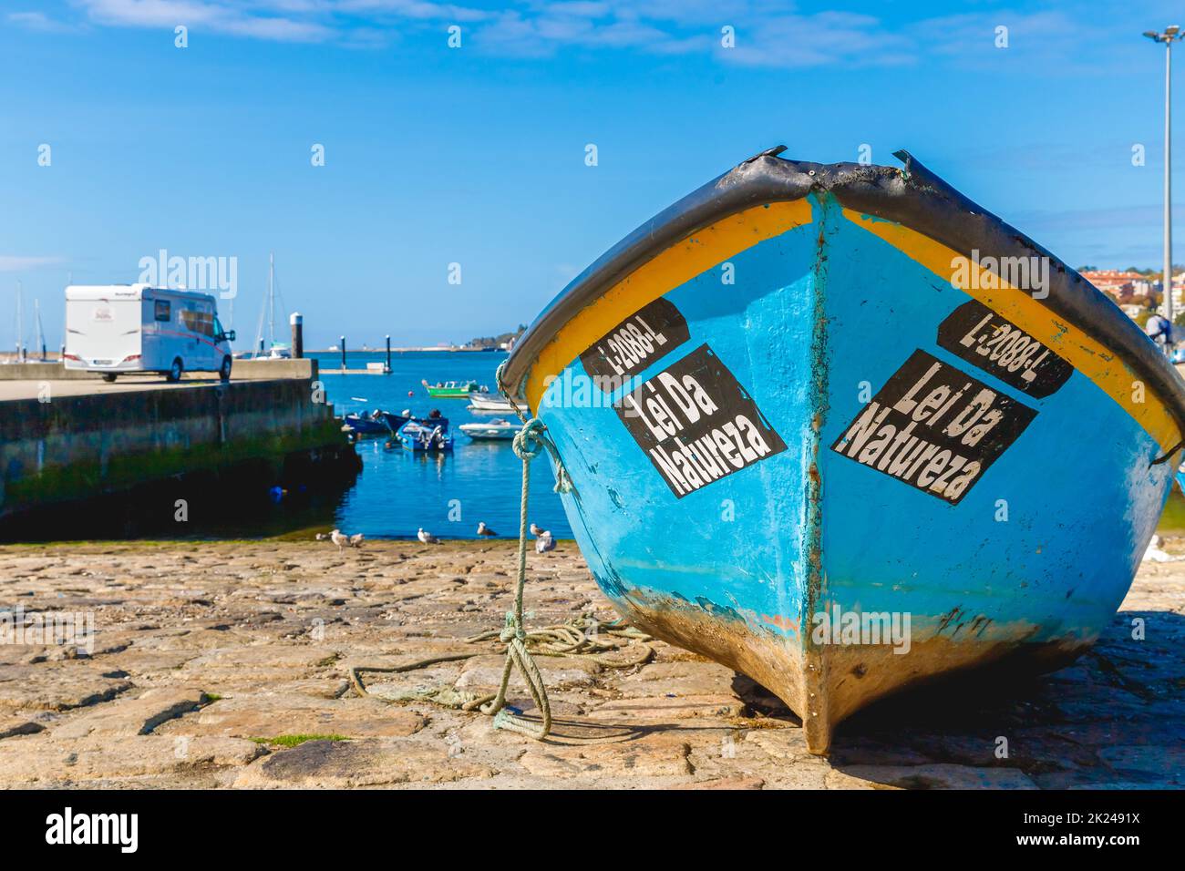 Porto, Portugal - October 23, 2020: Small fishing boats in the fishing port of Afurada at the exit of the mouth of the Douro river on an autumn day Stock Photo