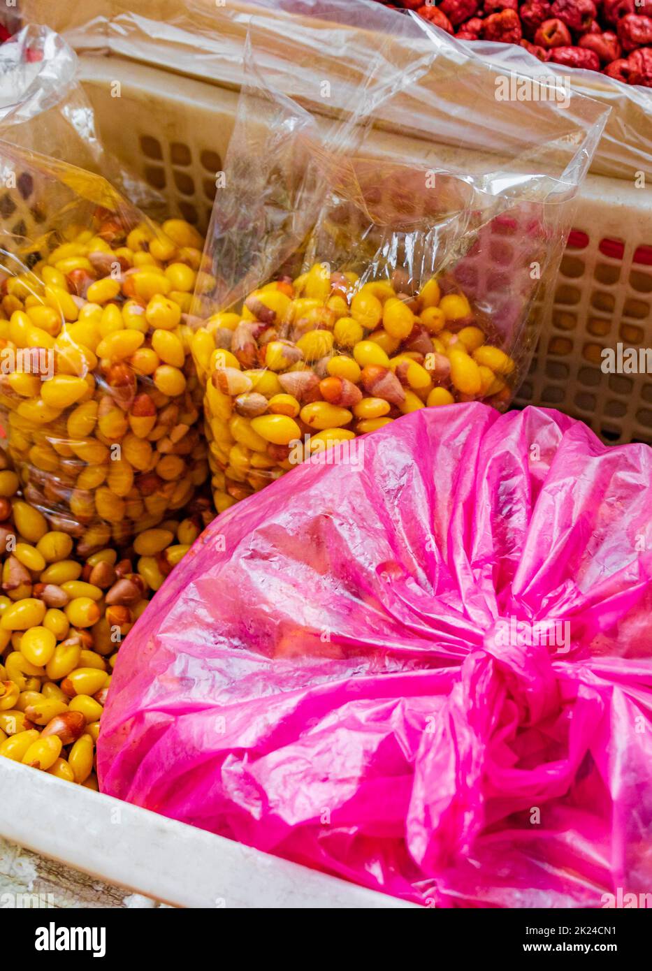 Sweeten Ginkgo Biloba natural seed Ginkgo flavoneglycosides Thai food Chinese cuisine in street food market in China Town Bangkok Thailand. Stock Photo
