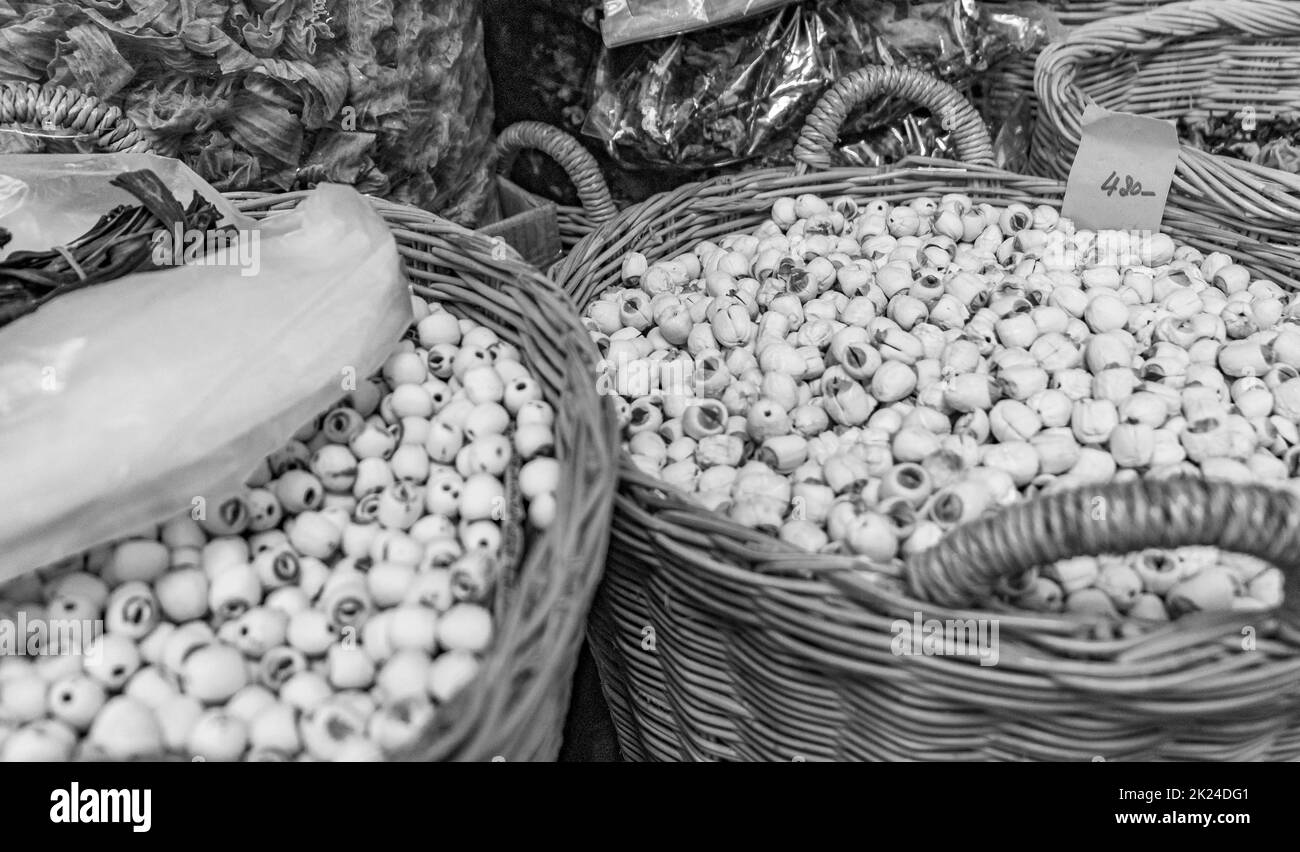 Selection of nuts and seeds in baskets Thai food and Chinese cuisine in