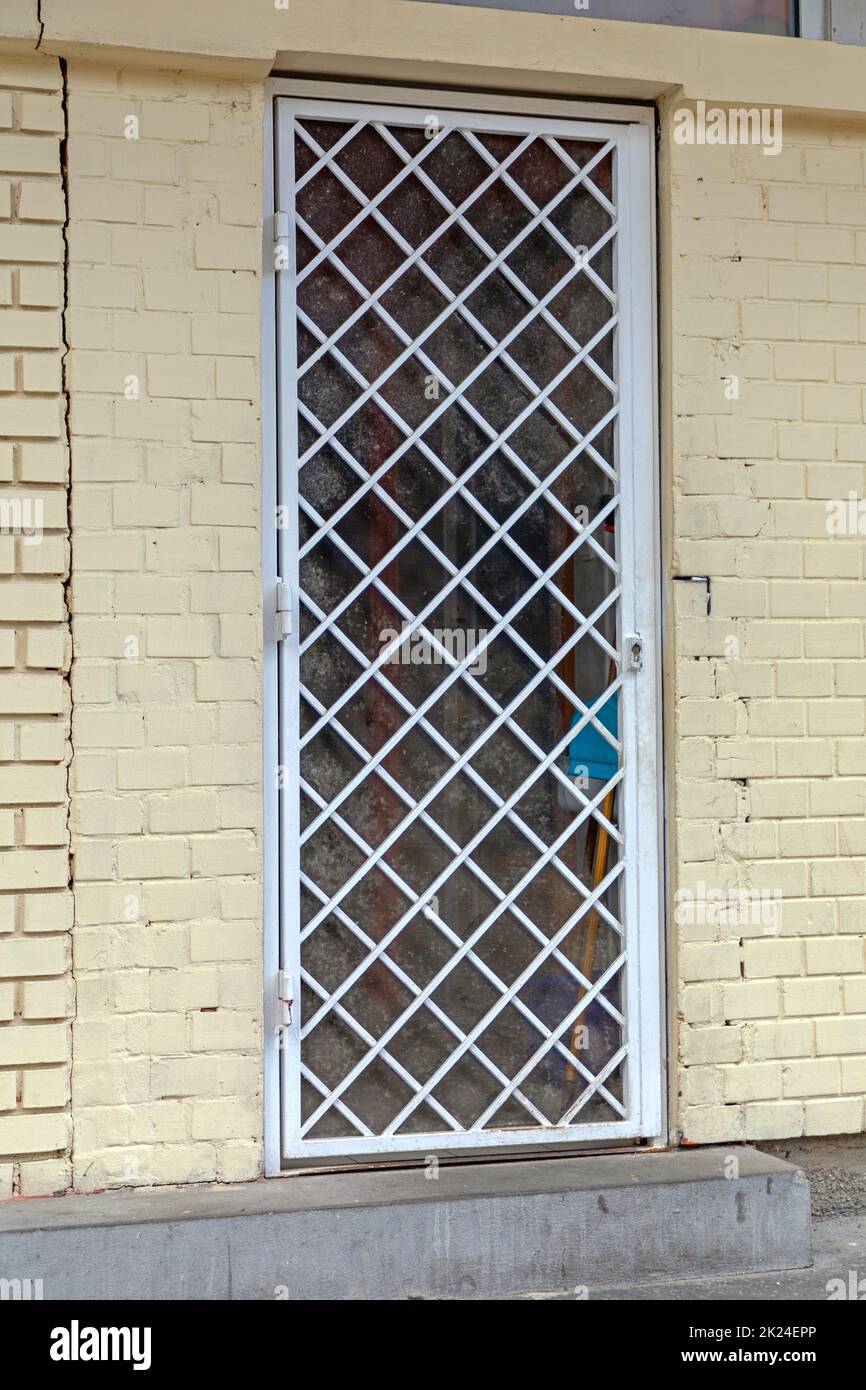 Closed Door With Bars Protection at Building Stock Photo