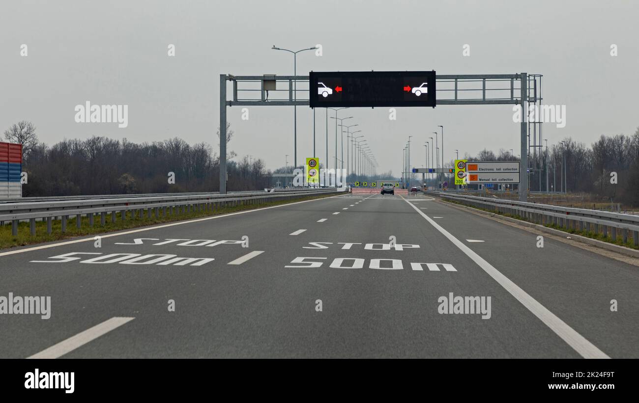 Electronic Info Board Over New Highway in Europe Stock Photo