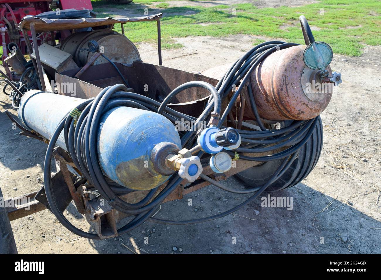 Gas welding equipment. A cylinder with propane and a cylinder with oxygen Stock Photo Alamy