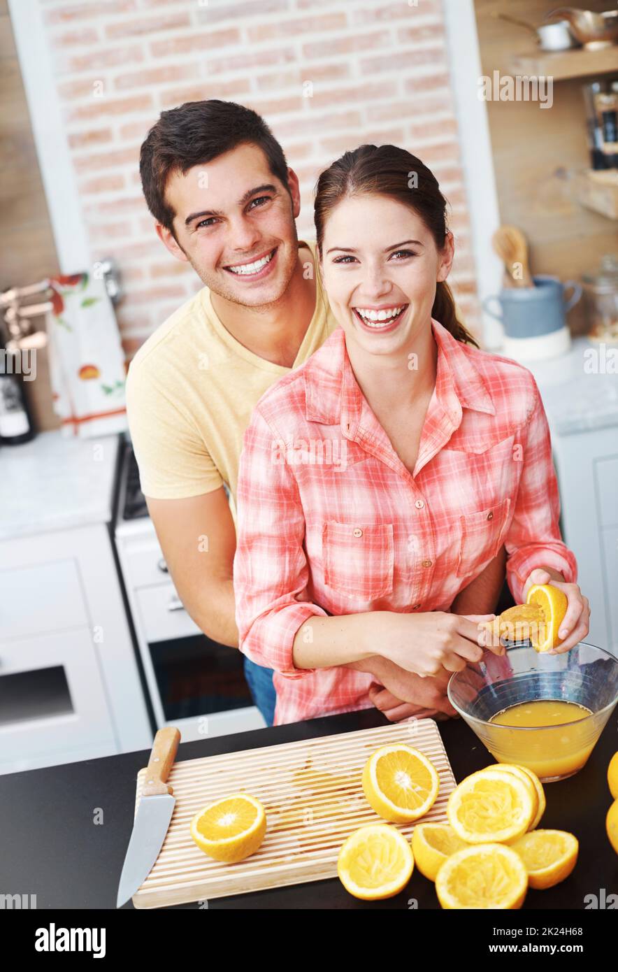 Its the perfect start to any day. A happy young couple making orange