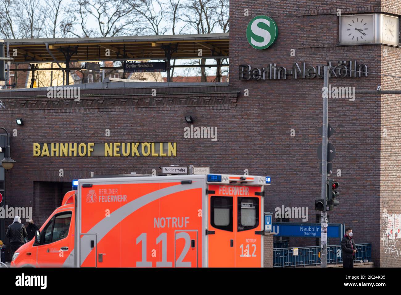 An ambulance in front of the Neukölln S-Bahn and U-Bahn station in the district of the same name in the Berlin district of Neukölln has degenerated in Stock Photo