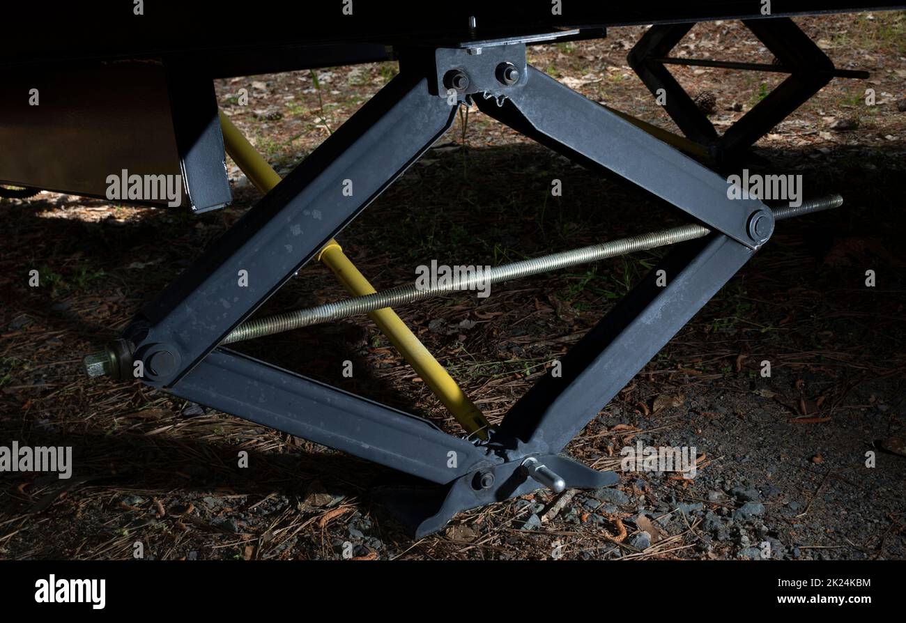 Camper trailer outrigger extended fully to the ground Stock Photo Alamy