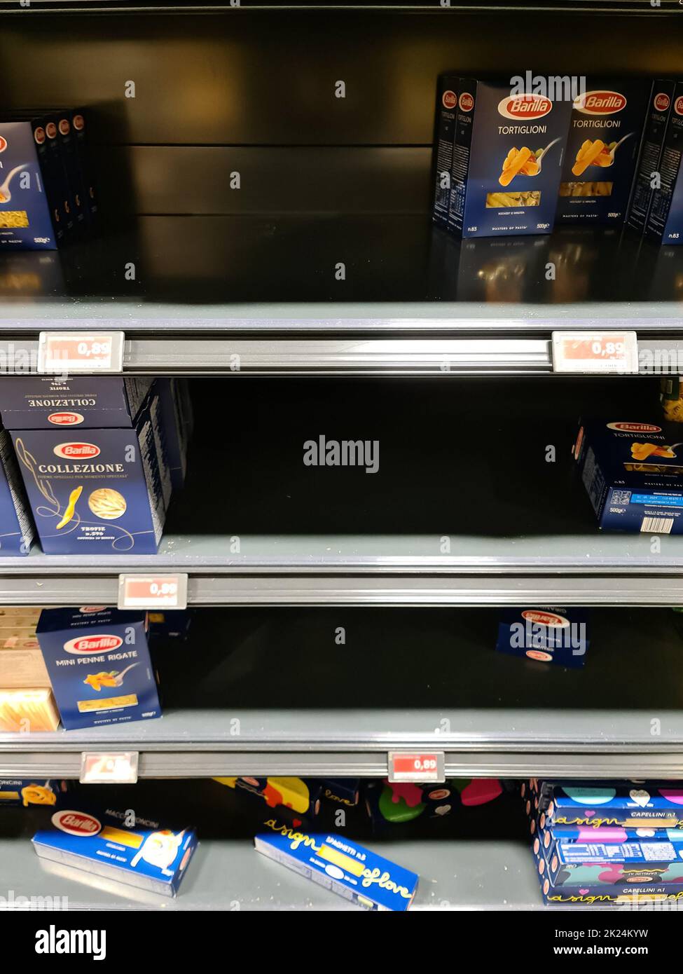 Kiel, Germany 15. February 2022 A nearly empty supermarket shelf with fewer Barilla brand
