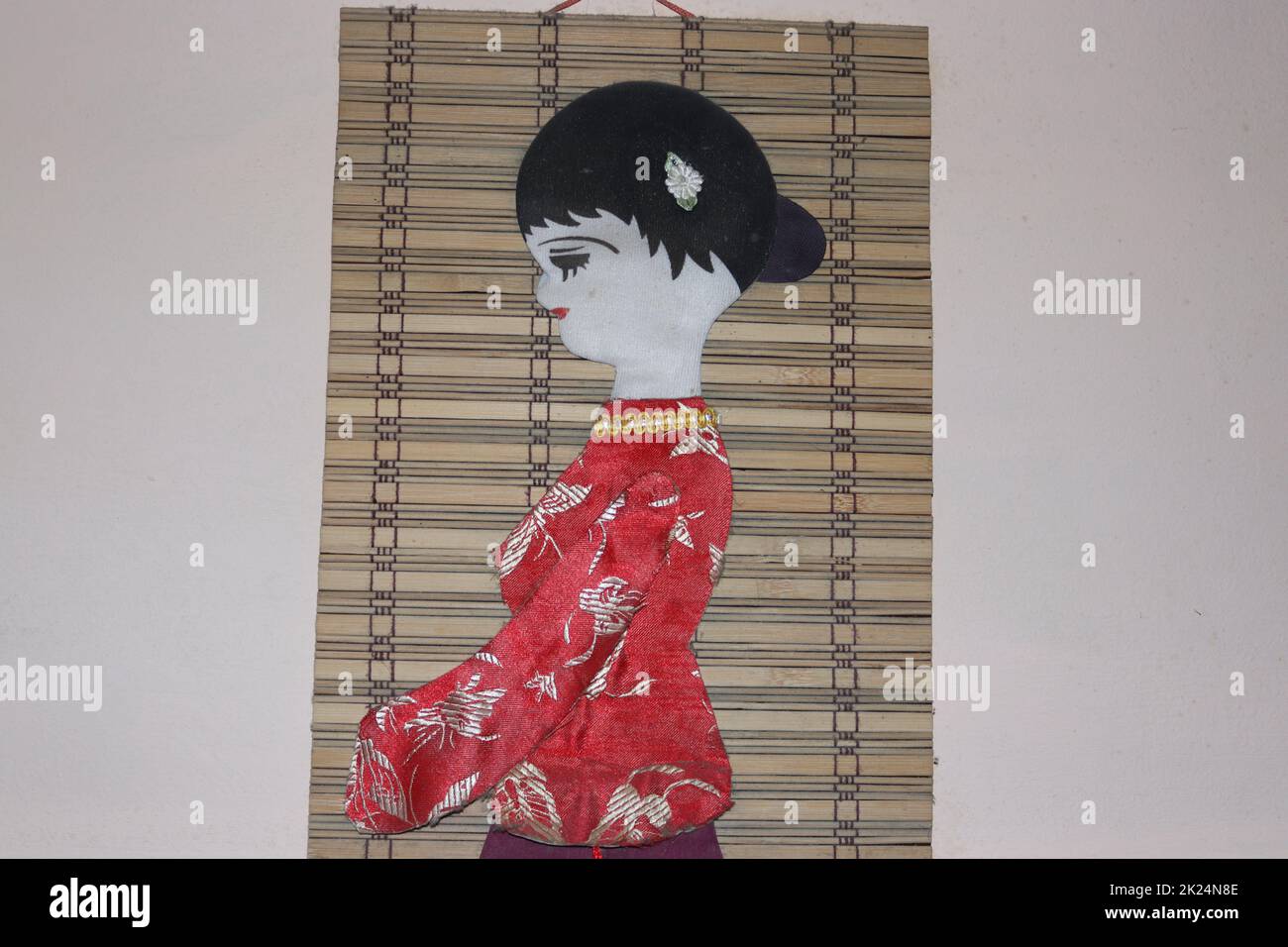 Artwork of an japan geisha found on a wall Stock Photo