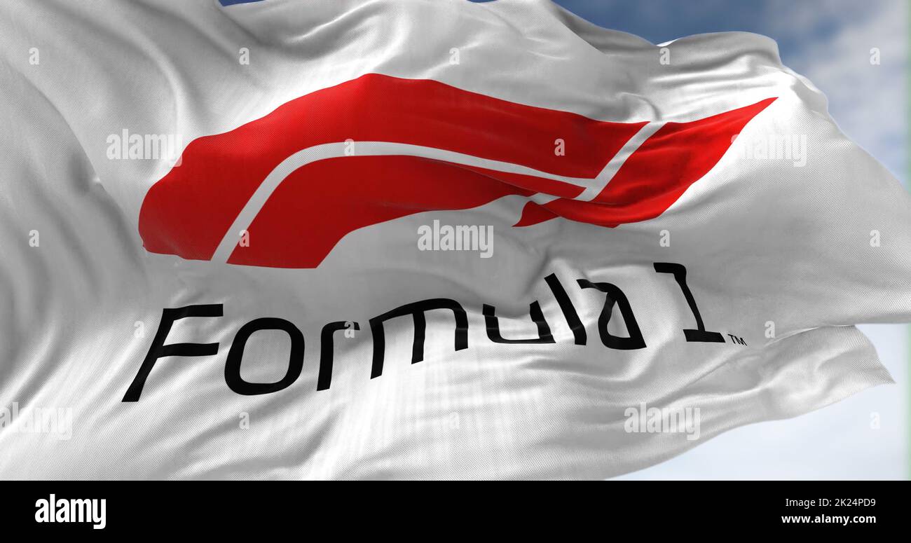 Monza, Italy, March 2022: Close-up view of the white flag with the Formula One logo waving in the wind. Illustrative editorial Stock Photo