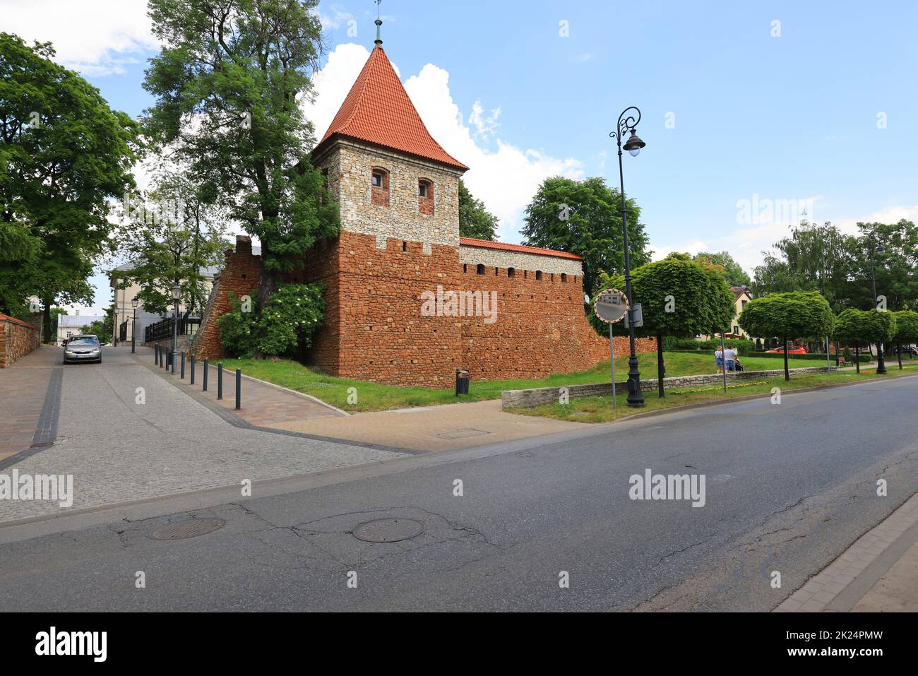 Olkusz, Poland - June 9, 2021: Tower and a fragment of city walls from the 14th century near Krakow Stock Photo