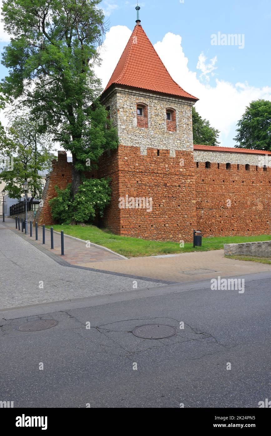 A tower and a fragment of city walls from the 14th century near Krakow, Olkusz, Poland Stock Photo