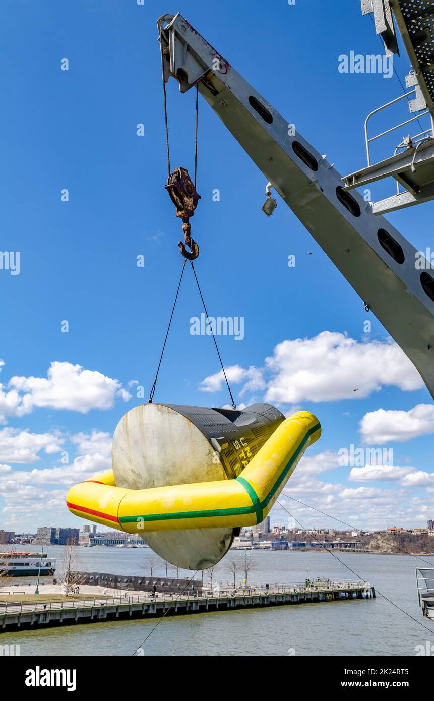 Capsule hanging down the Intrepid at Intrepid SeaAirSpace Museum, New York City during sunny
