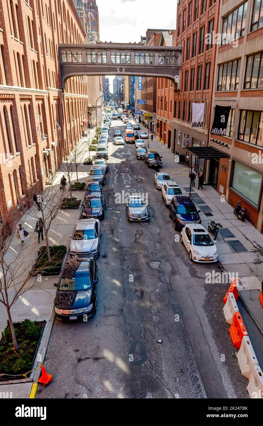 City street with lots of parked Cars in Chelsea, New York City, aerial view from the High Line
