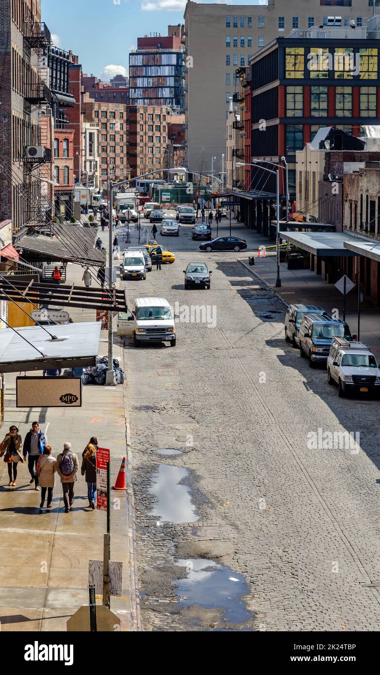 Chelsea City Street with people walking on sidewalk and traffic on the ...