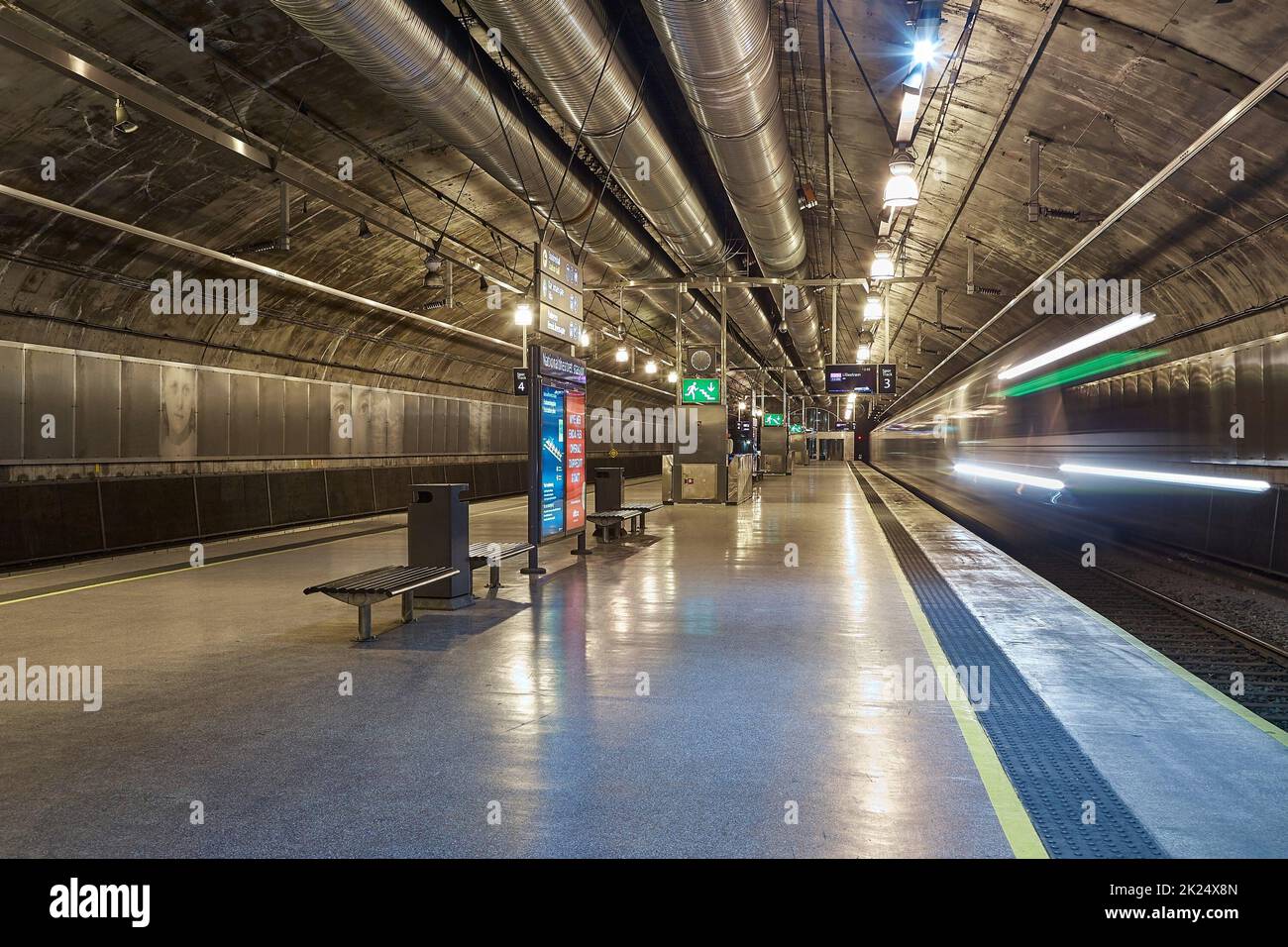 Oslo, Norway - Circa 2015: Underground train station in Oslo, capital of Norway train arriving with motion blur Stock Photo