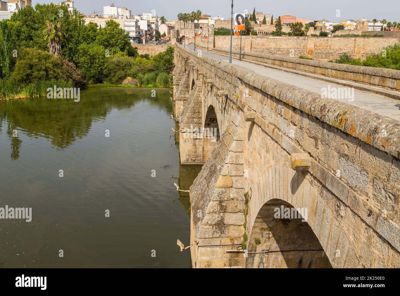 Merida, Spain - September 13, 2021. The Puente Romano, an old bridge still in use over the Guadiana River at Merida. Founded by ancient Rome in wester Stock Photo