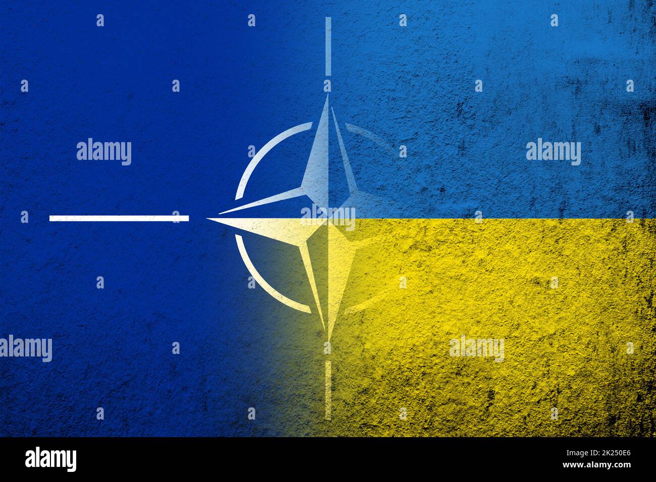 National flag of Ukraine with Flag of North Atlantic Alliance NATO. Grunge background Stock Photo