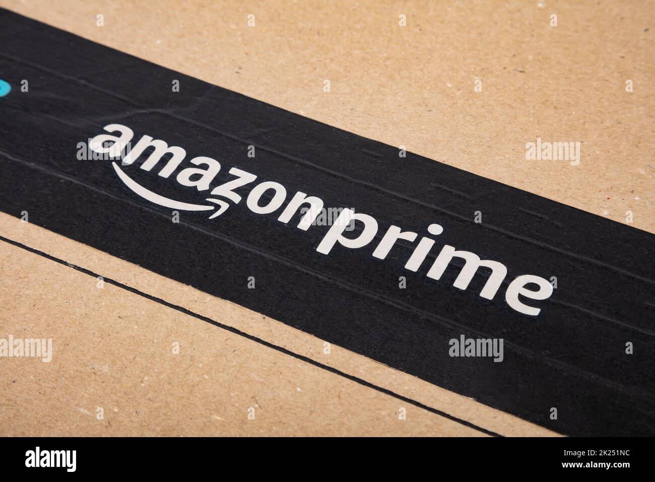 WETZLAR, GERMANY 2022-04-25: Amazon Prime shipping box with branded tape on it. Amazon is an American electronic commerce and cloud computing company. Stock Photo