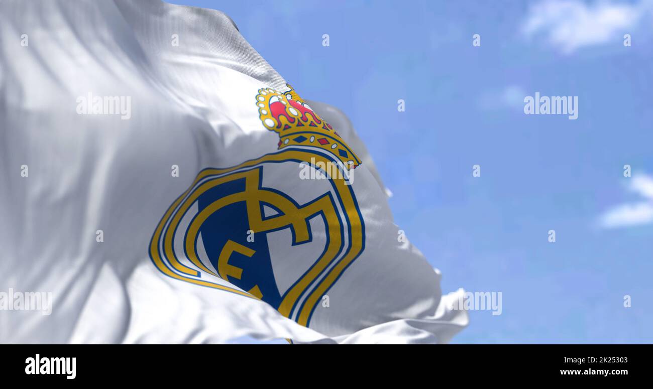 Madrid, Spain, May 2022: The flag of Real Madrid Club de Fútbol waving in the wind on a clear day. Real Madrid C.F. is a Spanish professional football Stock Photo