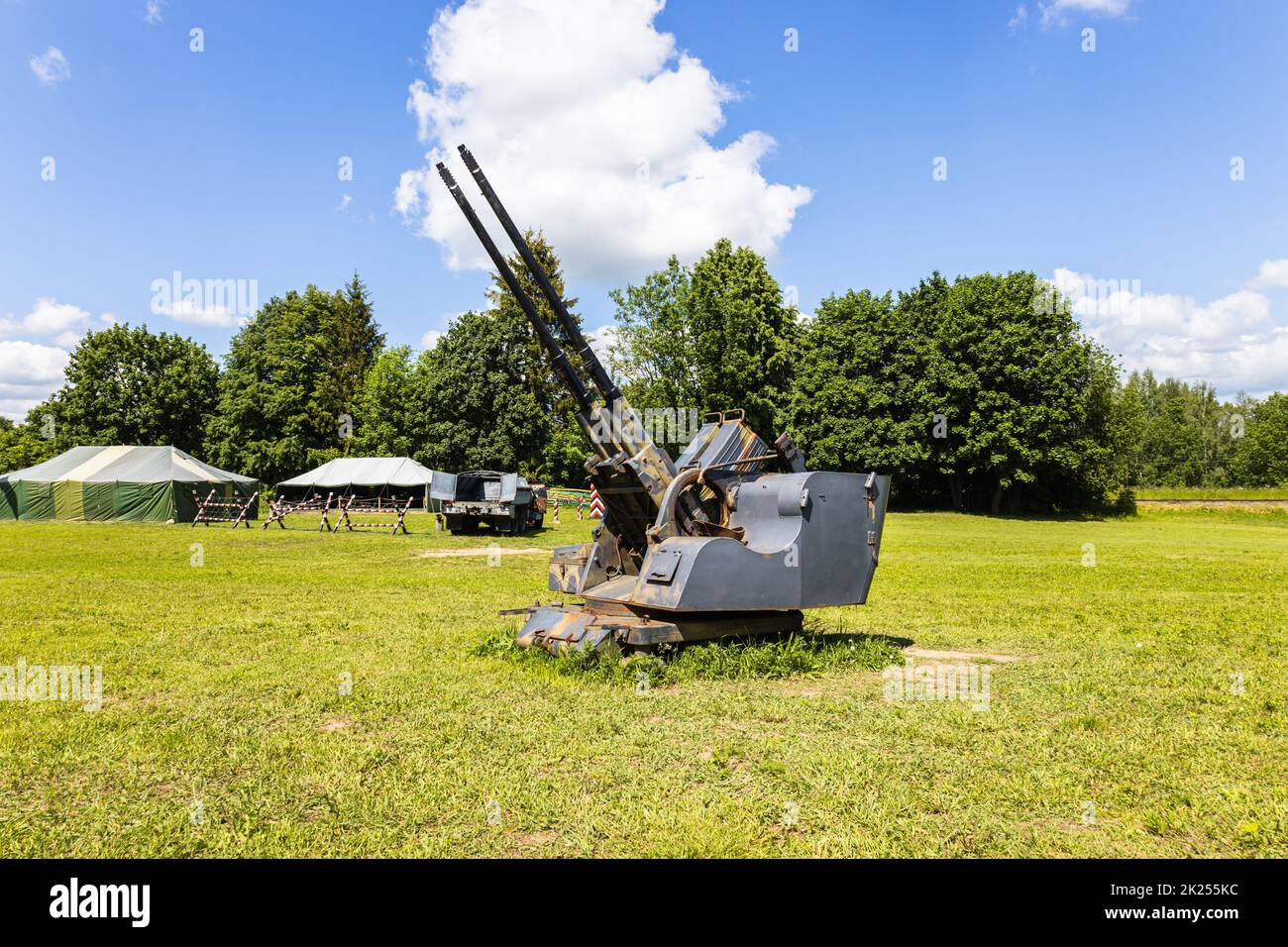 Super heavy old anti-aircraft guns in the outdoor museum. Ketrzyn, Poland, 11 June 2022. Stock Photo