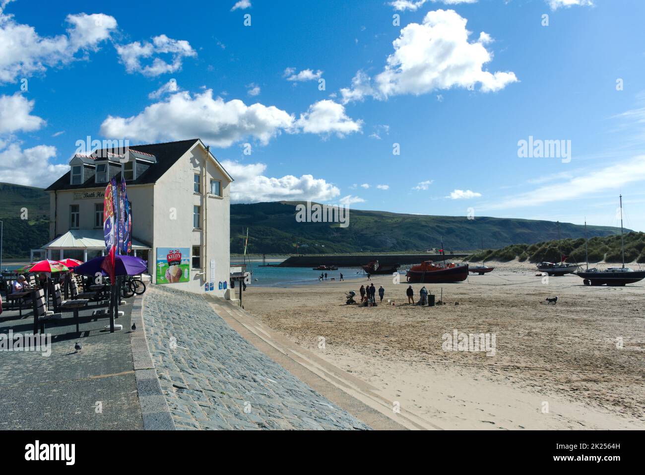 Barmouth, Gwynedd, Wales – September 16, 2022: Beautiful beach on a summer day looking out towards the Mawddac estuary.  Copy Space. Stock Photo