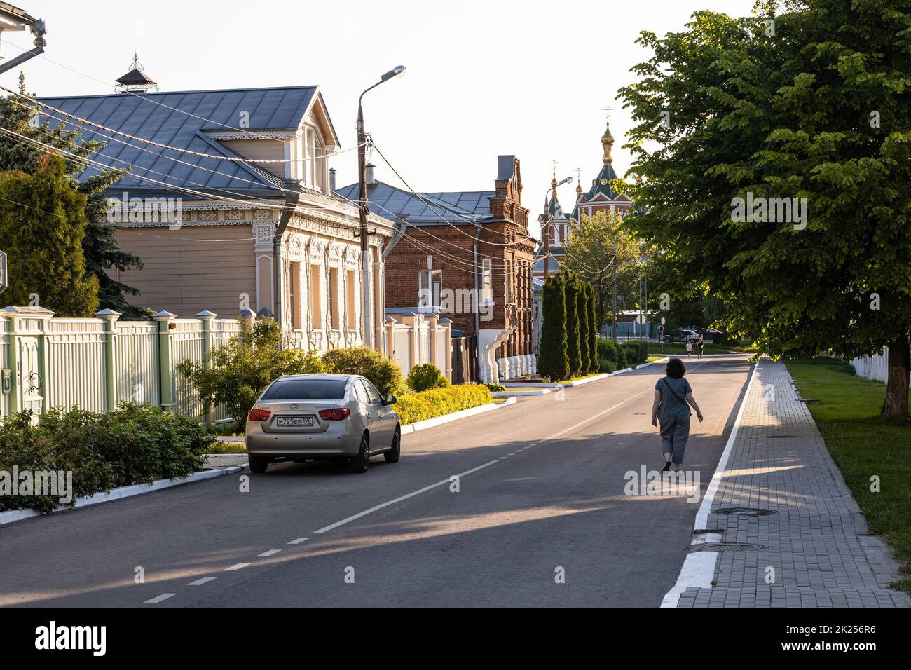 Kolomna, Russia - June 9, 2022: Kazakov street with typical old wooden houses in Old Kolomna city on sunny summer evening Stock Photo