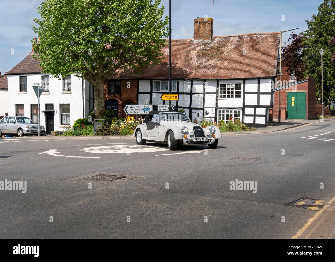 Tewkesbury, UK, May 2022 A car on the roundabout in the market town