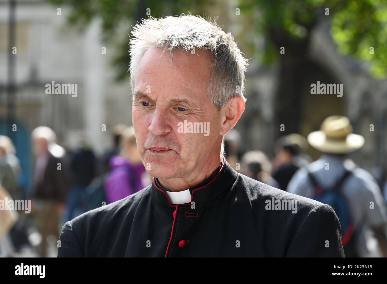 London, UK. Giles Goddard - Vicar of St John's Waterloo. Rally in Parliament Square to highlight the severe impacts of climate change already affecting communities around the world. Stock Photo