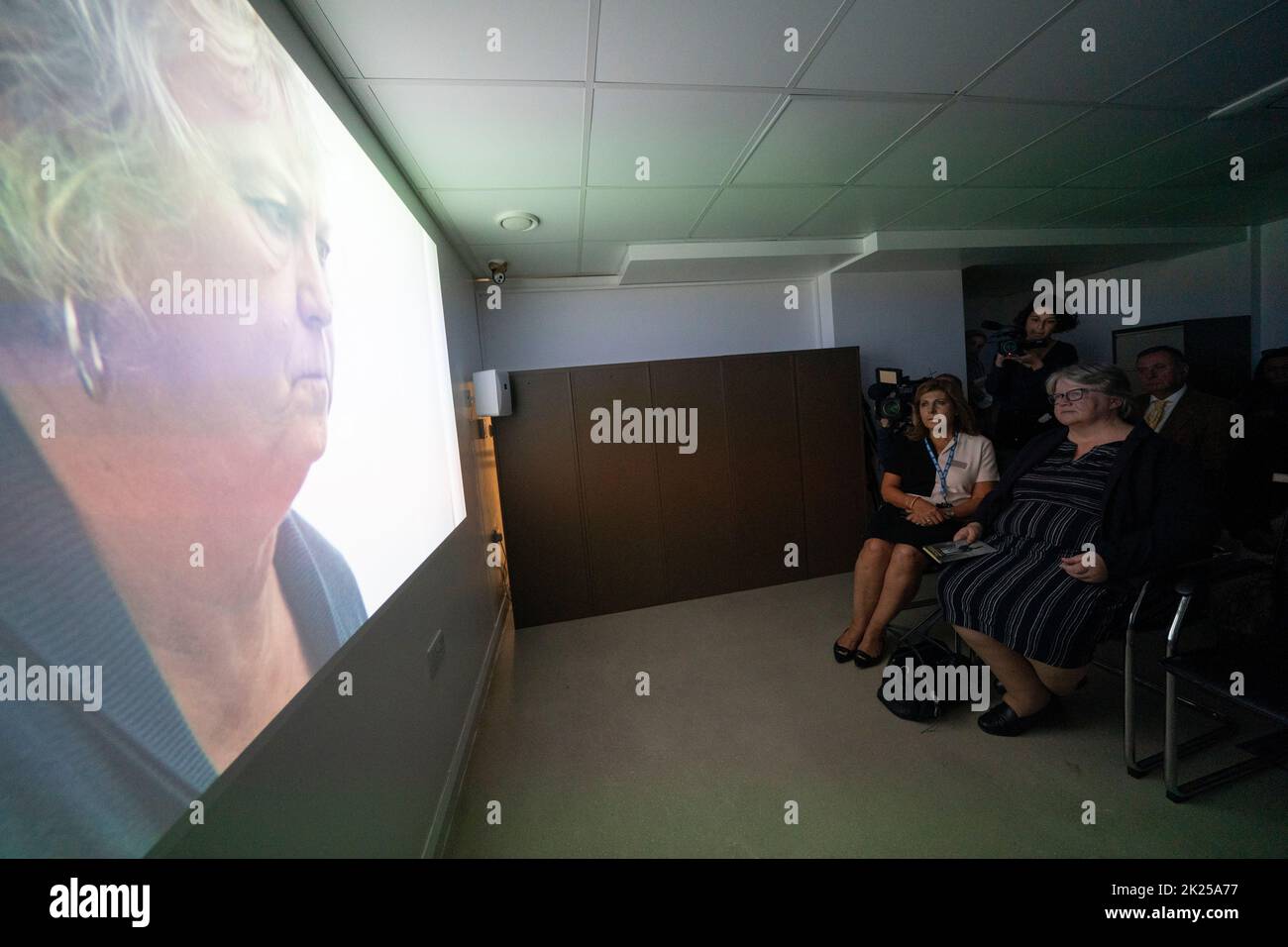 Health and Social Care Secretary Therese Coffey (right) watches a film on patients with psychosis during her visit to The Marven Surgery in London, following her announcement to help patients receive easier access to NHS and social care. Picture date: Thursday September 22, 2022. Stock Photo