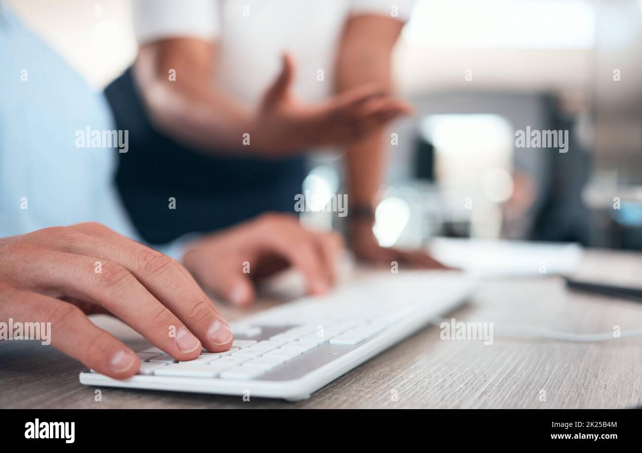 Business hands, typing computer keyboard and planning ideas, strategy and online research at desk with office staff. Zoom employees working pc desktop Stock Photo