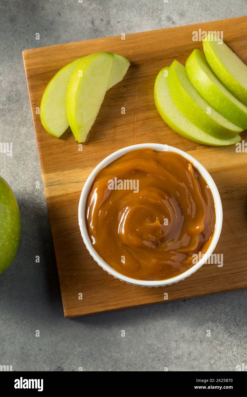 Homemade Caramel Dip with Green Apples Ready to Eat Stock Photo