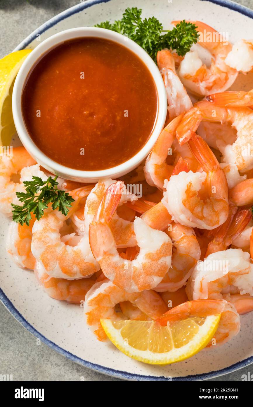 Homemade Cold Shrimp Cocktail with Lemon and Sauce Stock Photo