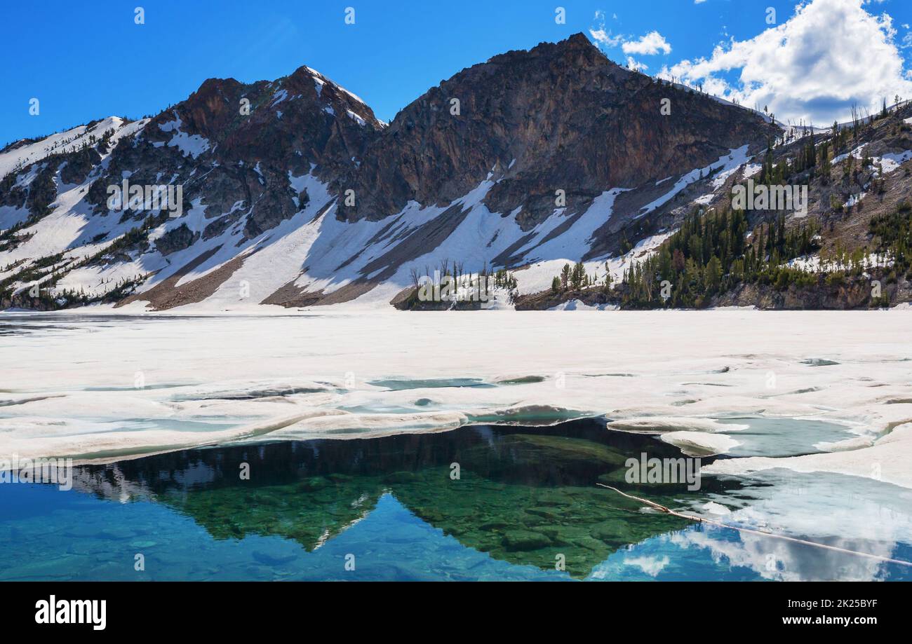 Serenity lake in the mountains in summer season. Beautiful natural landscapes. Stock Photo