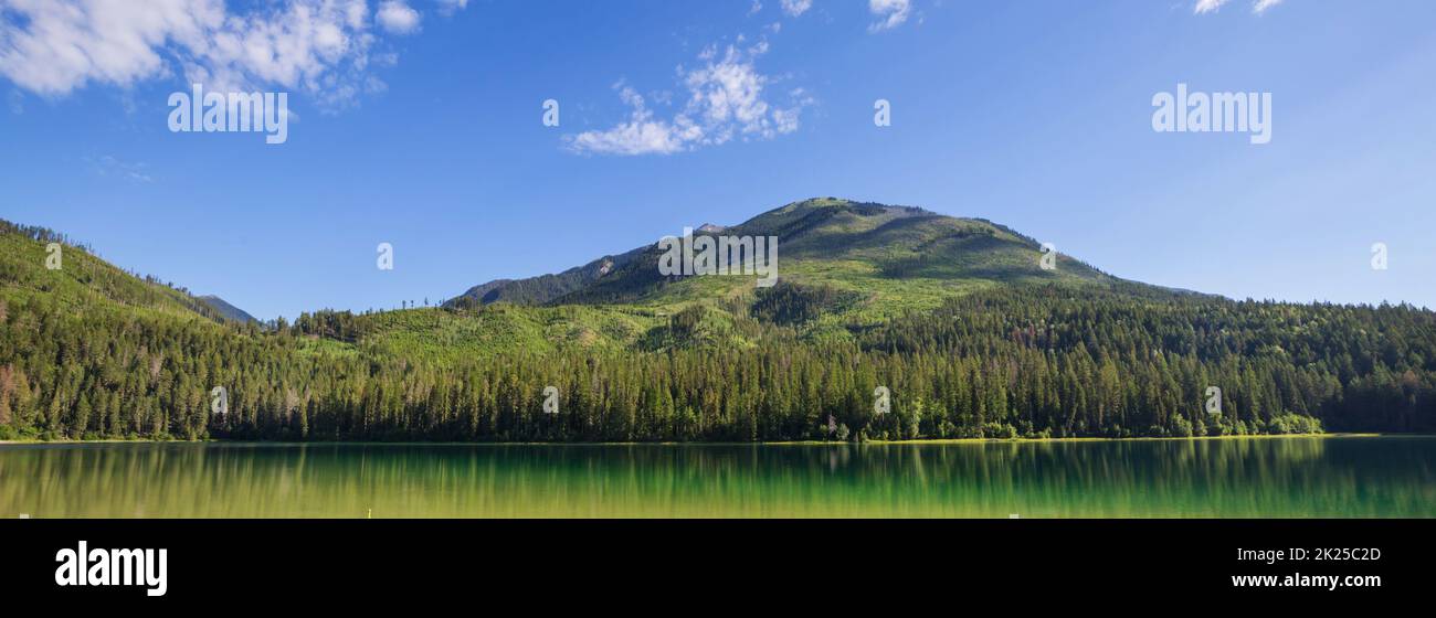Serene scene by the mountain lake in Canada Stock Photo