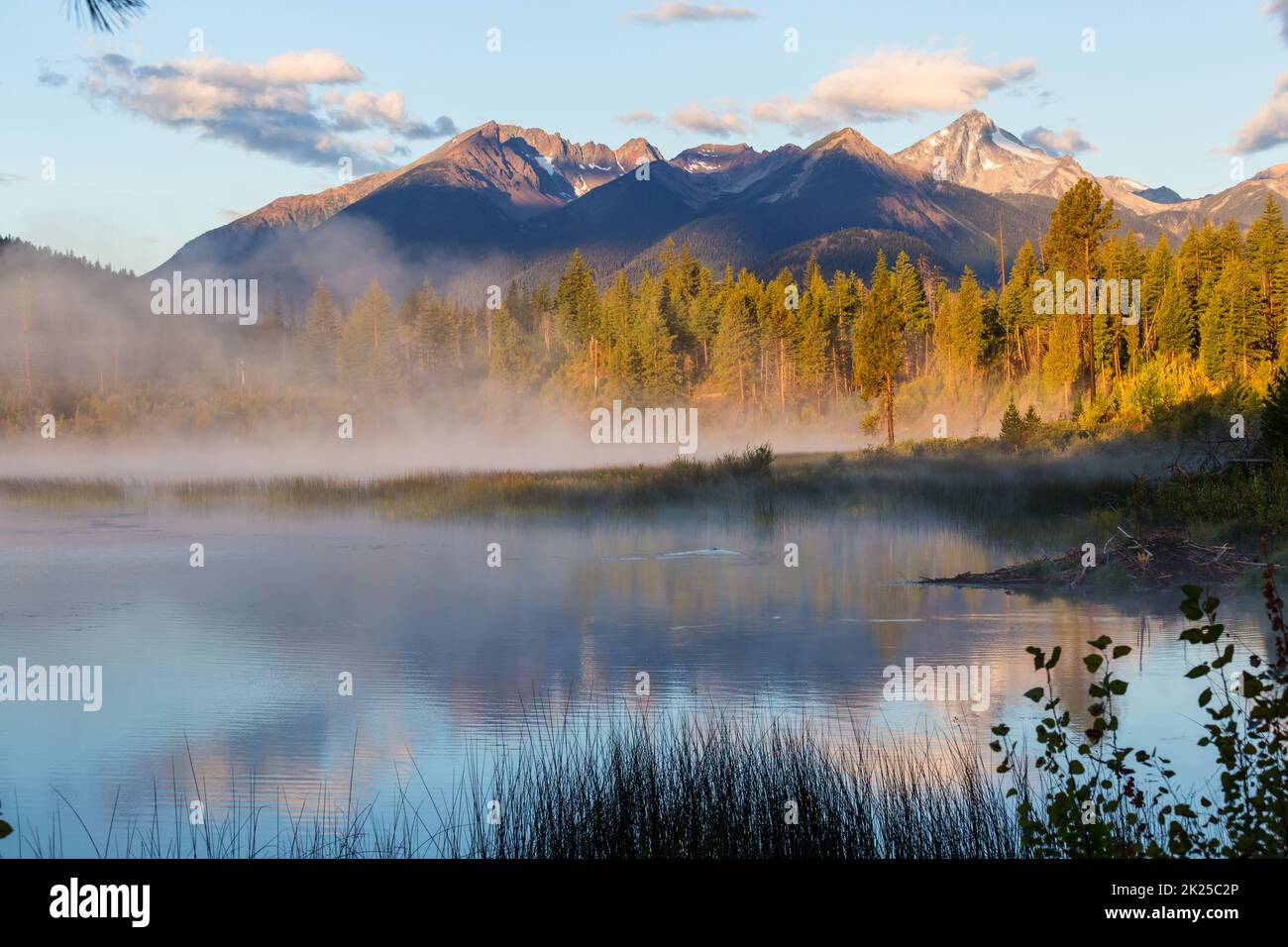Serene scene by the mountain lake in Canada Stock Photo